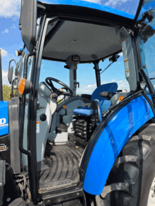 Cab of the New Holland T4.75 with operator's seat