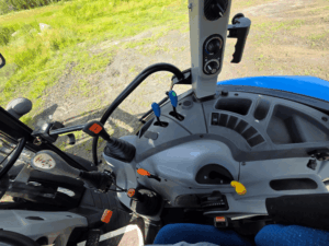 Hydraulic levers and controls inside the New Holland T4.75