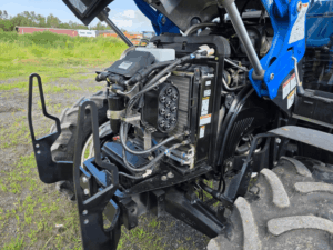 Open engine compartment of the New Holland T4.75 tractor