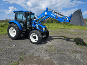 Blue New Holland T4.75 tractor with front loader