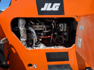 Engine compartment of the 2022 SkyTrak JLG 8042 telehandler opened for inspection