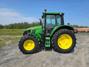 Used 2020 John Deere 6110M tractor side view for sale