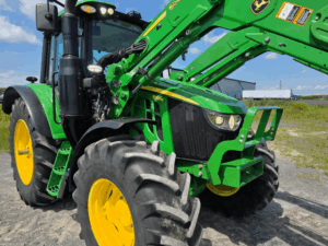 2022 John Deere 6110M tractor with 600R loader front right view
