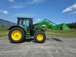 2022 John Deere 6110M with 600R loader and bucket side view