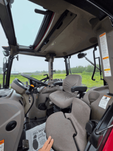 Case IH Farmall 105U cab interior with operator seat