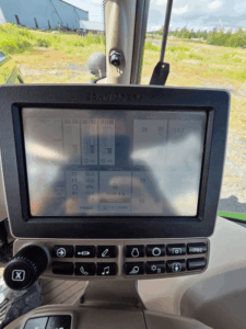 2016 John Deere 6145R display showing 2,089 hours